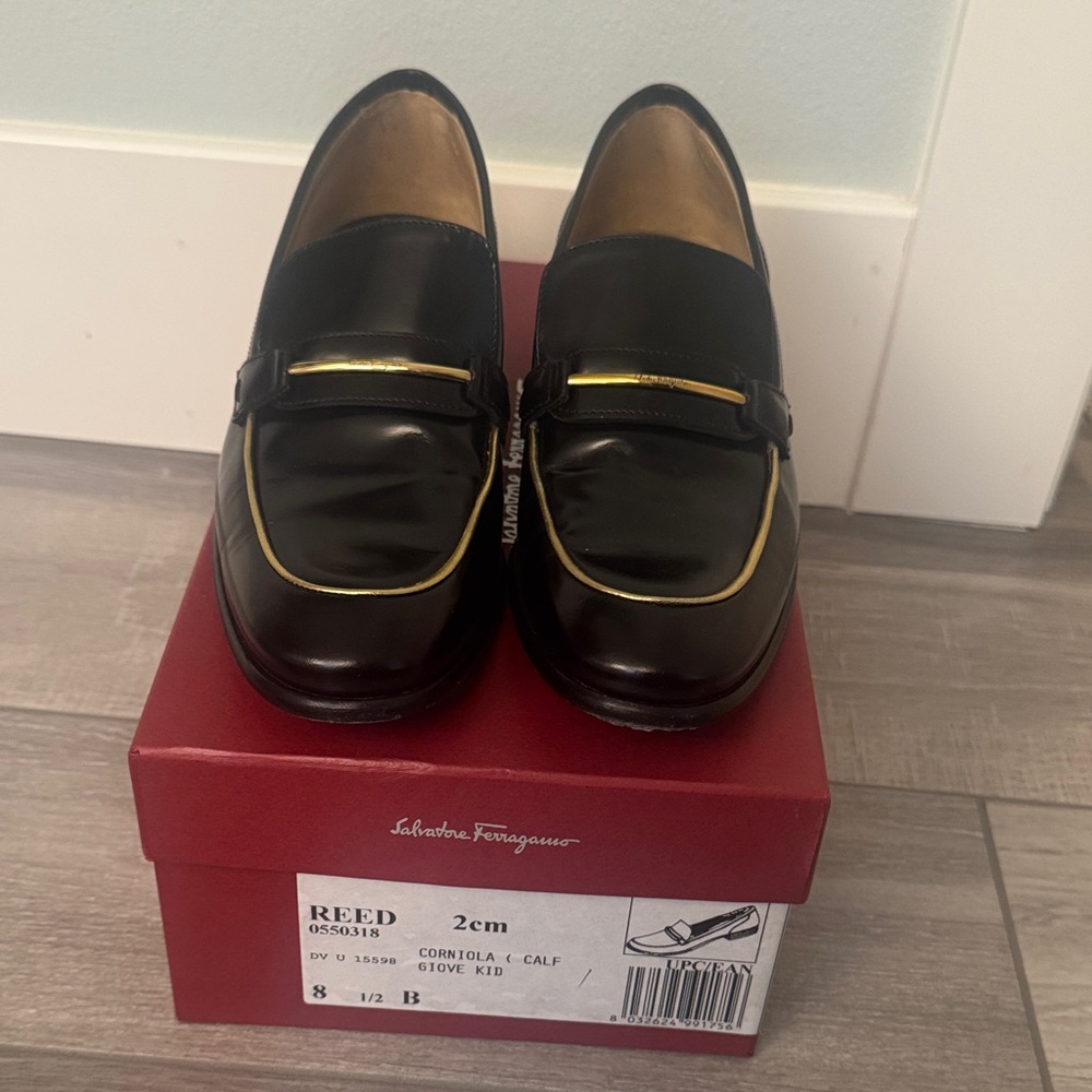 Salvatore Ferragamo Black Leather Penny Loafers with Gold Trim